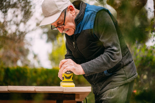 istock Retiring Man Making Table in His Free Time 1253798719