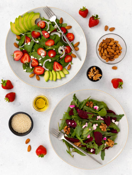 istock Summer vegetarian salad in a gray plate on table 1253798767