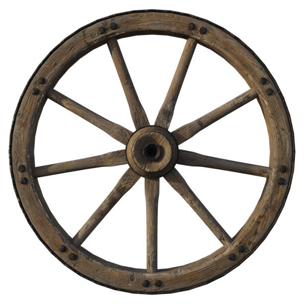 Old western theme scene with wagon wheel and wooden boards