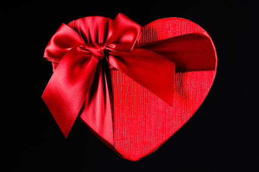 Red heart box on black background