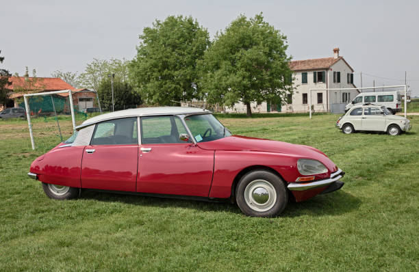 Izmir, Turkey, June 28, 2015: Old fashioned car parked under the tree in Izmir. The Volkswagen Type 1, widely known as the Volkswagen Beetle, was an economy car produced by the German auto maker Volkswagen (VW) from 1938 until 2003 