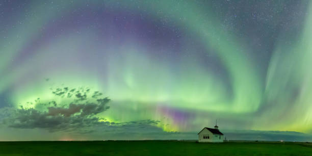 Northern Lights over an abandoned one-room schoolhouse