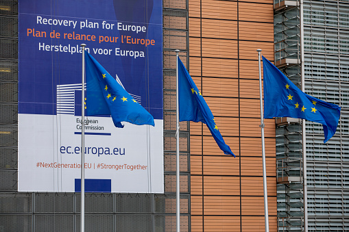 BRUSSELS, Belgium -july 1s, 2020: European flags in the wind in front of The \
