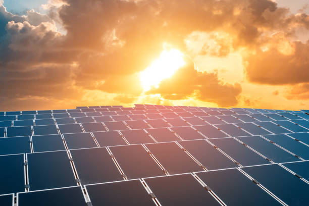 istock solar energy power plant with sunset sky background  - 1253808112