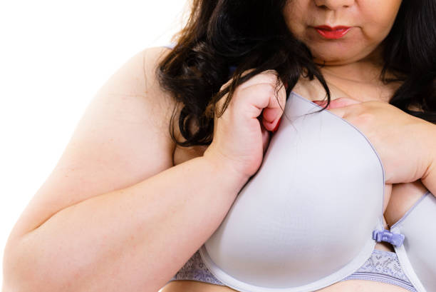 istock Fat woman big breast wearing bra 1253808164