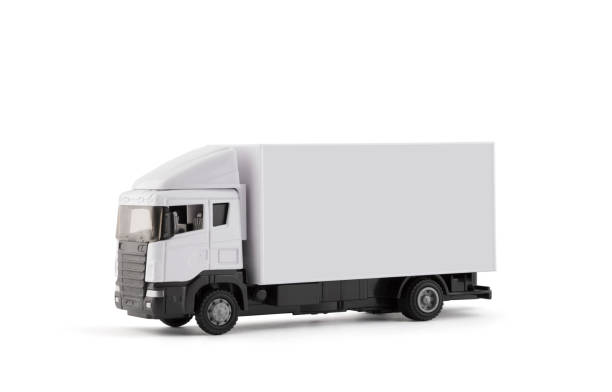 istock White cargo delivery truck miniature isolated on white background with clipping path 1253810489