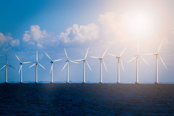 istock Wind turbines in the ocean 1253810603