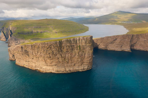 istock Faroe islands dramatic coastline in Vagar. Leitisvatn lake 1253810962