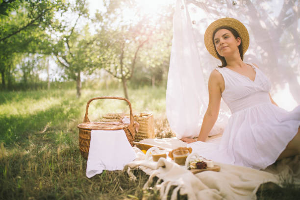 istock Beautiful young woman enjoying nature 1253811113
