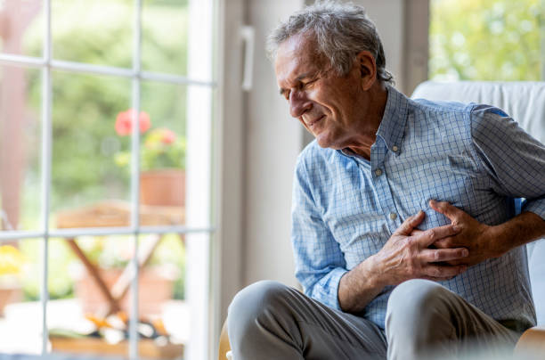 Senior man Suffering From Chest Pain Senior man Suffering From Chest Pain chest pain stock pictures, royalty-free photos & images