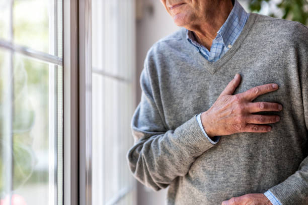 istock Senior man Suffering From Chest Pain 1253816160