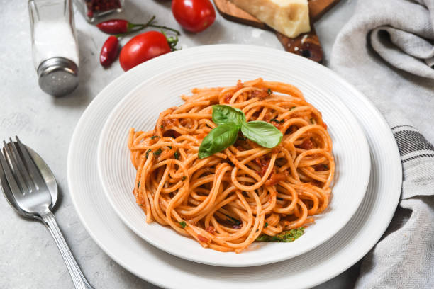istock Italian spaghetti with tomato sauce 1253816319