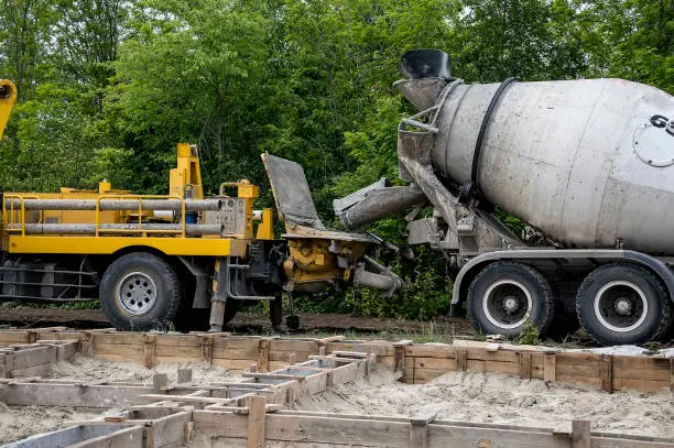 Mixer truck is transport cement to the casting place on building site.