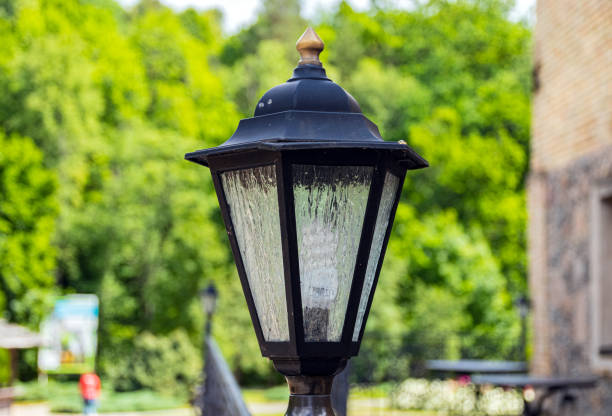 istock Old cast-iron lantern in a city park. Close-up. 1253819424
