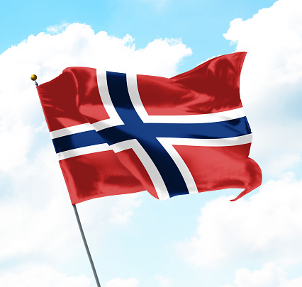 Flag of Norway Raised Up in The Sky