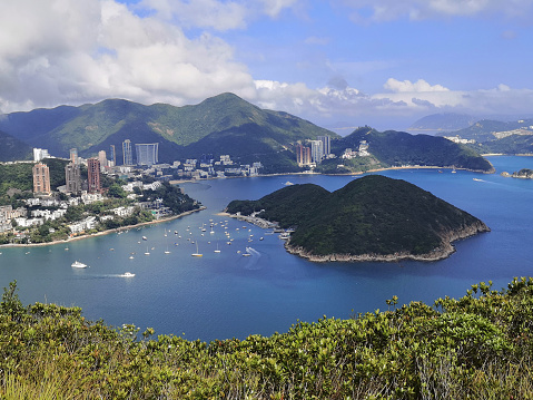 Panorama of Deepwater Bay and Hong Kong south coast from Nam Long Shan, or Brick Hill, a hill on the Hong Kong Island near Wong Chuk Hang and Aberdeen. At an elevation of 247 metres, it overlooks the South China Sea and Aberdeen Channel.