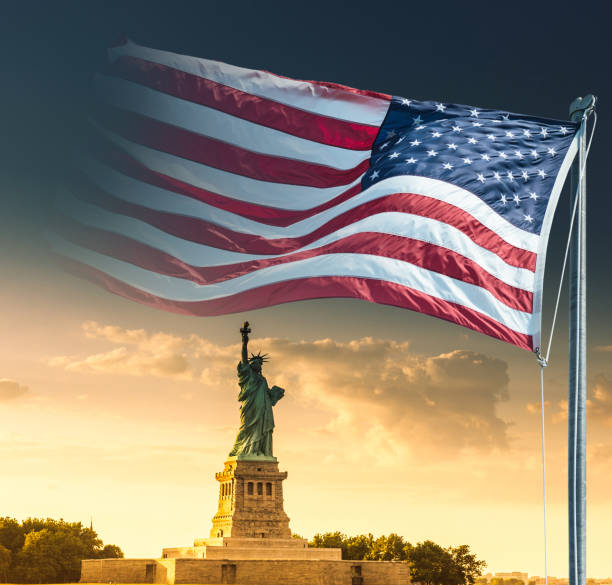 istock us flag on the statue of liberty 1253824831