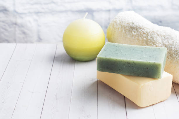 istock Concept SPA and Wellness. Massage brush, cosmetic oils and soap. Light background. Copy space 1253826019