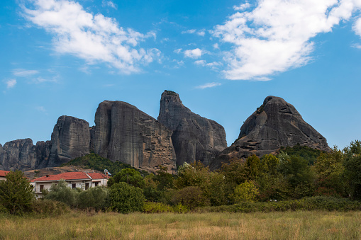 Stunning view of the majestic Meteora mountains from village of Kastraki in Greece. Meteora is a geological miracle of nature and the world. Unique cliffs on tops of which are Orthodox monasteries.