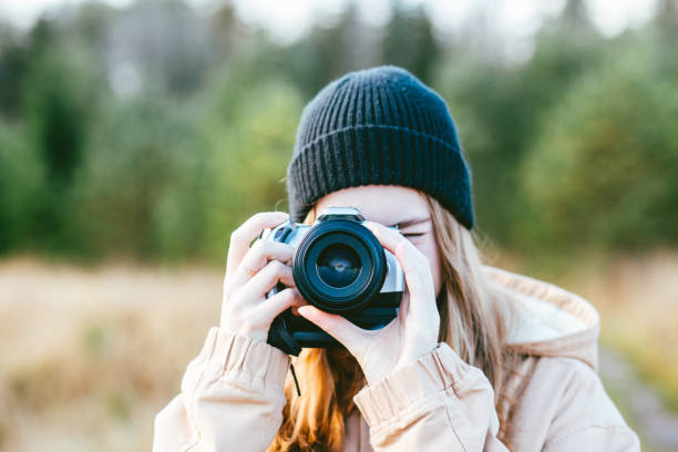 istock Young nature photographer 1253828966