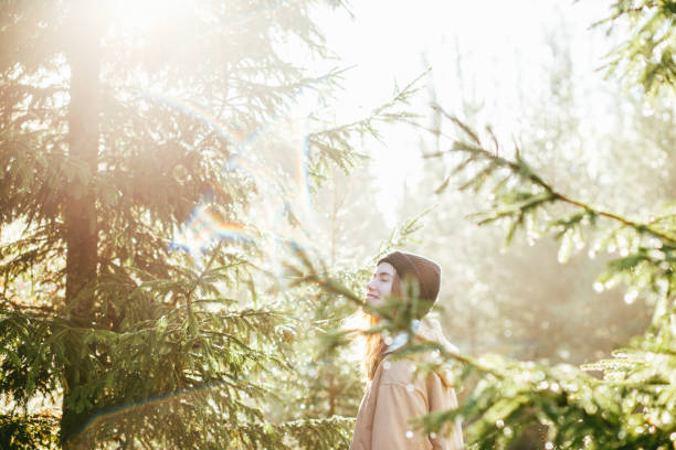 istock Young woman enjoying nature 1253828998