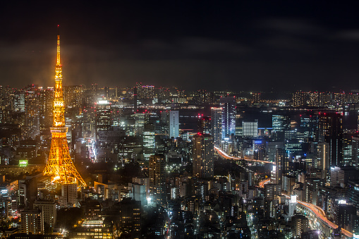 Tokyo Tower and Cityscape Illuminated at Night, viewed from Tokyo City View And Sky Deck in the Roppongi Hills Mori Tower.