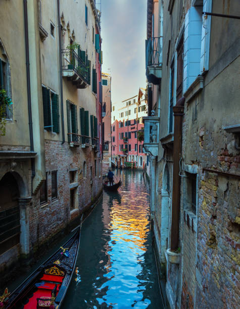 istock Gondola ride along the Venetian canals 1253835178