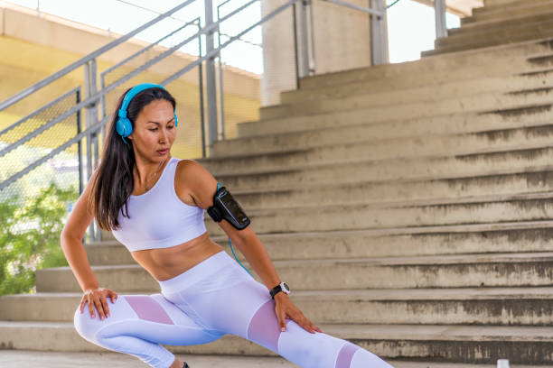 istock Sportswoman stretching and preparing to run. 1253837138