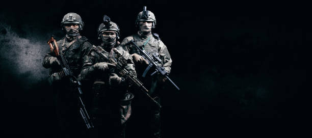 istock Image of three soldiers in a shooting computer game. ESports concept. 1253837767