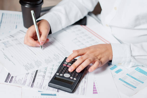 istock Man doing his accounting, financial adviser working 1253841226