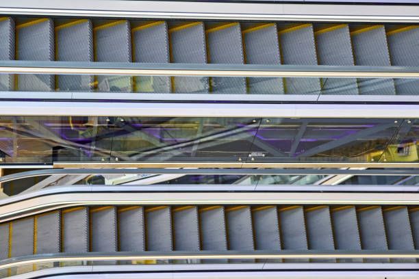 istock Modern escalators in shopping center 1253841355