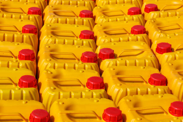 Group of traditional african yellow plastic canister for water or gasoline. Nosy Be, Madagascar