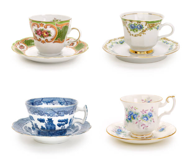 istock Luxury porcelain teacups on completely white background. Contains clipping path. 1253842815