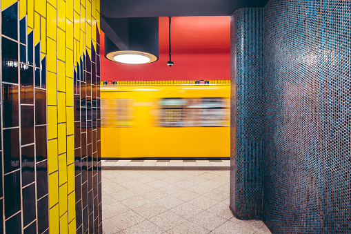 Blurred motion of Berlin yellow subway train.