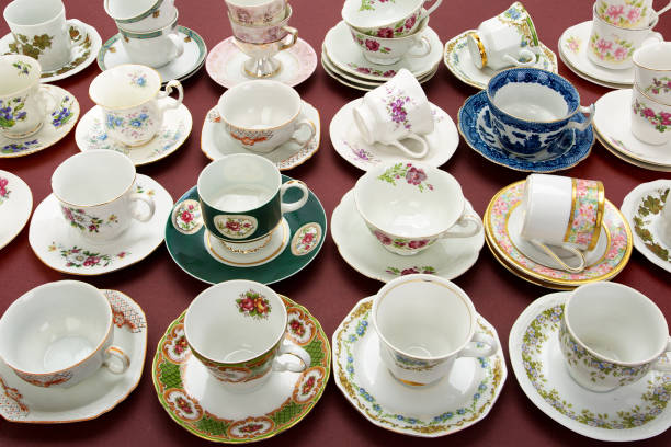 istock Group of various vintage porcelain teacups on colored background. 1253842853