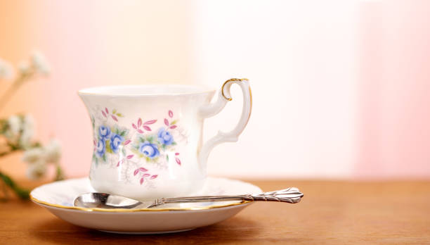 Antique china afternoon tea set with floral decoration.