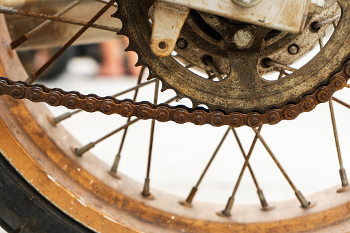 Old rusty motorcycle. typical vehicle in Asia. Parts and details of an old motorcycle.