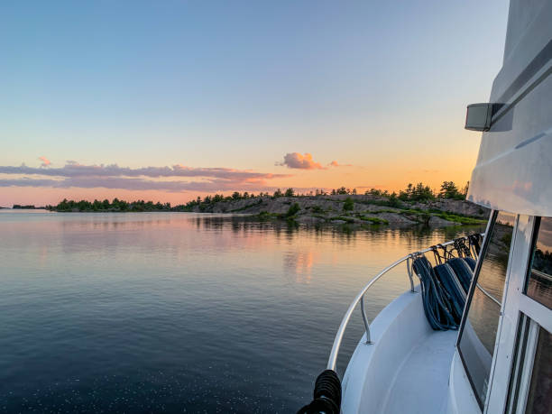 istock View from a boat of sunset over the islands 1253844058