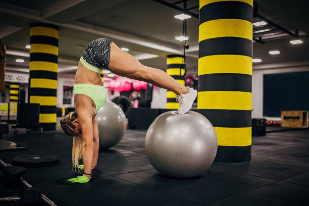 istock Sportswoman training in the gym 1253844862