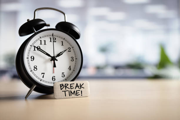 Break time concept Break time concept message with alarm clock on desk in office lunch break stock pictures, royalty-free photos & images