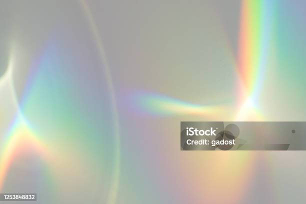Blurred Rainbow Light Refraction Texture On White Wall Stock Photo - Download Image Now