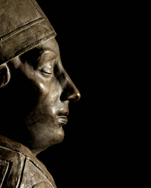 istock Saint Sculpture Over Black Background Template 1253849032