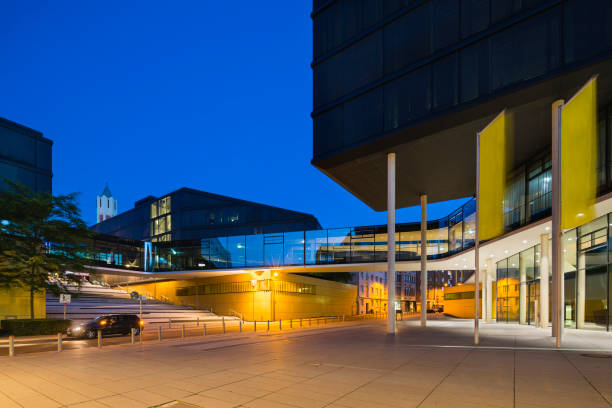 istock Modern Office Buildings At Night 1253849763