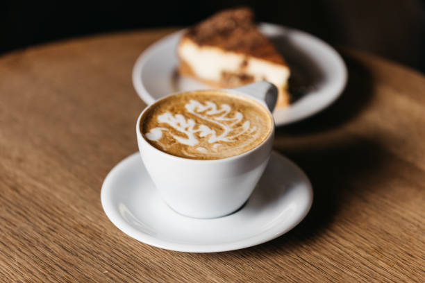 istock Caffe latte art and a piece of cake 1253851390