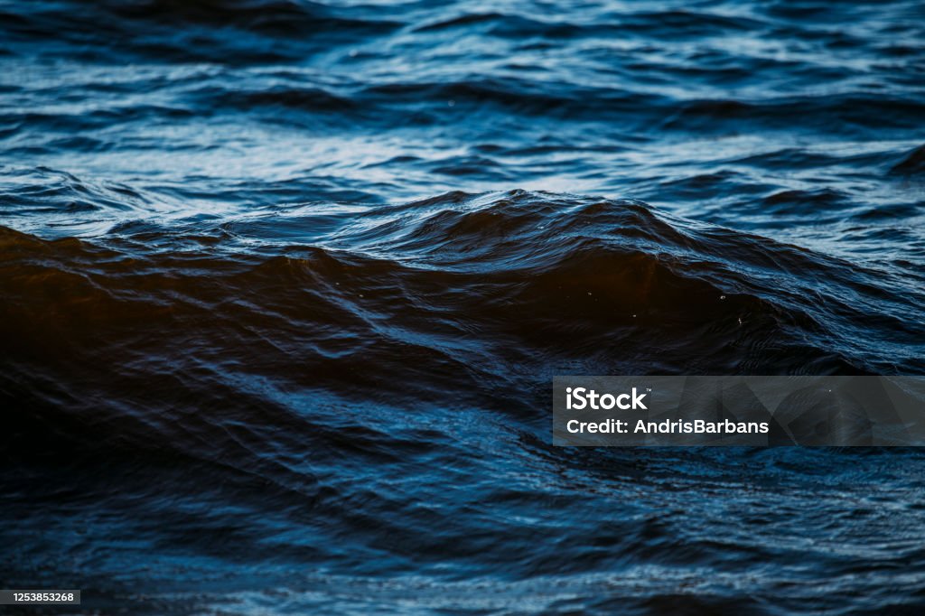 Dark blue waves in the water Sea Stock Photo