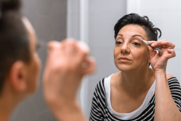 istock woman in  bathroom 1253854406