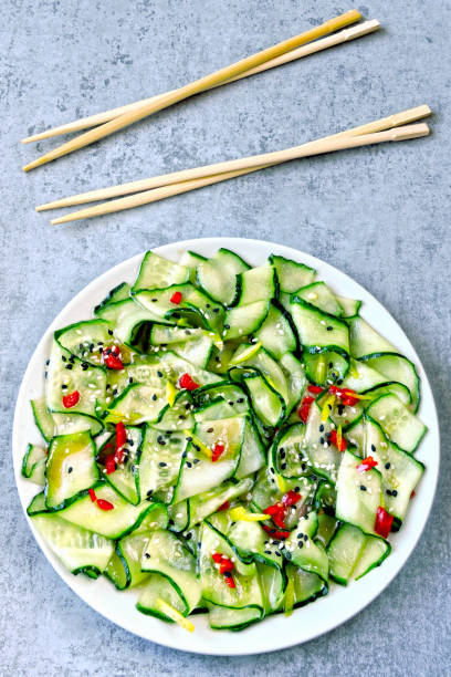 istock Salad with cucumbers and chili pepper. 1253855808