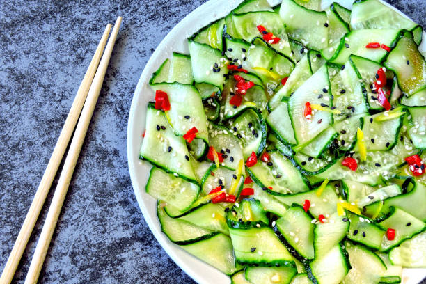 istock Salad with cucumbers and chili pepper. 1253855819