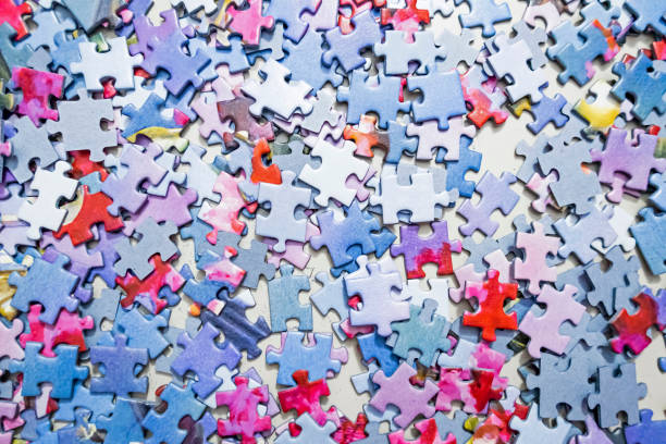 istock close up jigsaw puzzle pieces on background 1253855863