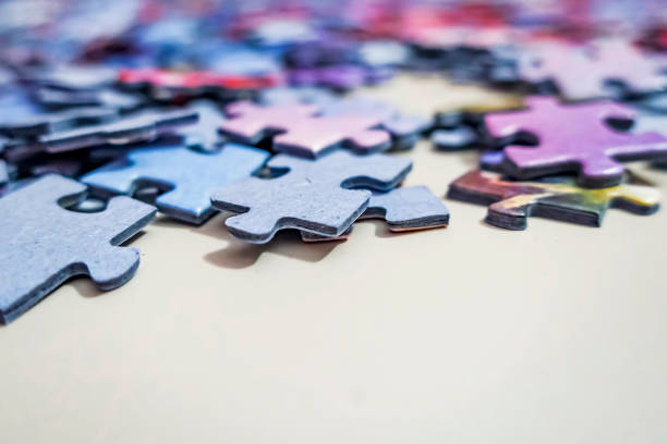 istock close up jigsaw puzzle pieces on background 1253855902